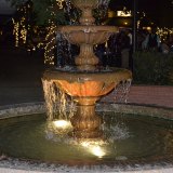 The downtown park fountain continues to flow.